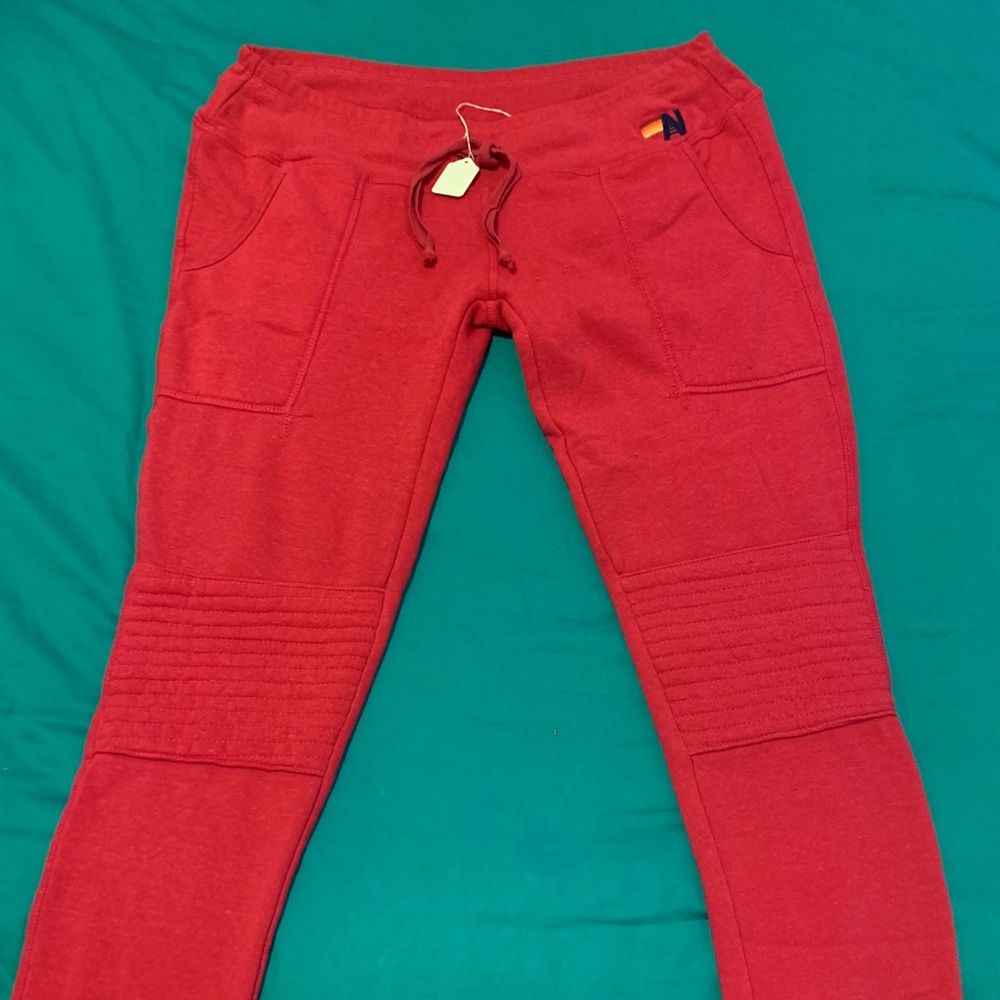 Hot pink moto style sweatpants from Aviator Nation